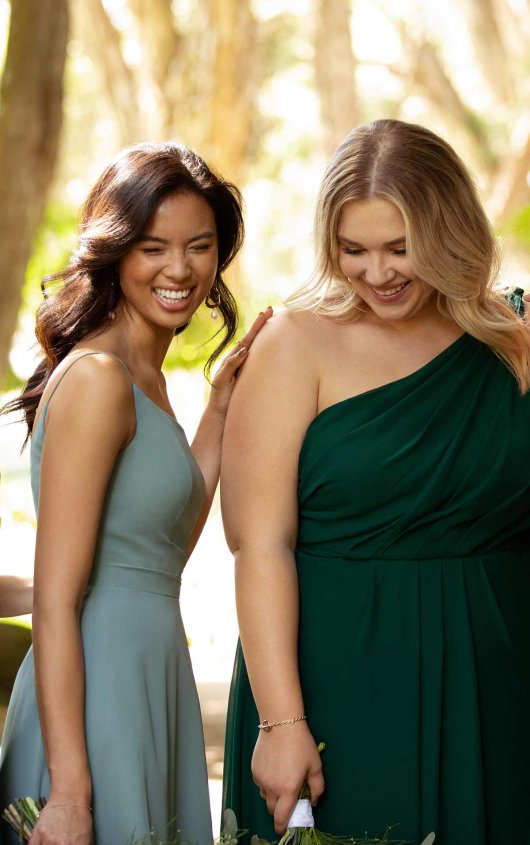 light green and dark green dresses from the front women laughing