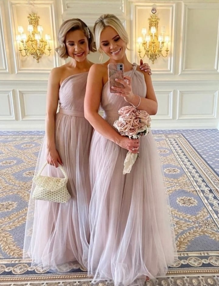 2 light pink dresses from the front
